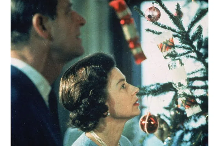 In this still from a 1969 documentary about Queen Elizabeth's life so far, you can get a peek at the very '60s-feeling tree (a time when Christmas trees were a bit more sparse and featured a delightful un-matching assortment of ornaments).