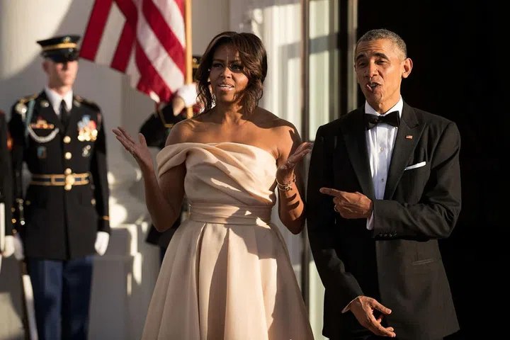 The President continues his tradition of pointing at the true star of these State Dinners.