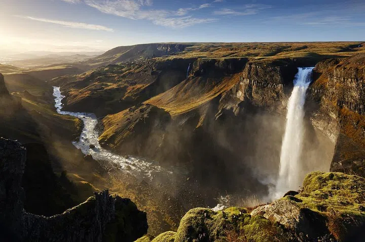 East Coasters can take advantage of overnight (and affordable!) flights to this fairytale of an island, courtesy of WOW Air and Icelandair. (Both airlines also offer free layovers, should you want to stop there on the way to Europe.) You’ll land in Reykjavik in time to have the whole day to explore one of the most delightful cities in the world. Don’t miss going to the top of the Hallgrímskirkja church (from above, the Crayola-colored houses look like Legos).

The best part about staying at the Kvosin Downtown Hotel—besides its amazing location and apartment-style rooms—is that breakfast at the café Bergsson Mathus is included. A weekend is just long enough to fit in the Golden Circle, a popular route that takes you to three major sights: Þingvellir National Park, Geysir (a, you guessed it, geyser), and Gullfoss waterfall. Along the way, you’ll drive by otherworldly landscapes and have to resist the urge to pull over every 10 minutes. The Blue Lagoon geothermal bath is another tourist spot that’s on every “must-do” list—and thanks to the opening of the luxe Retreat hotel, we highly endorse an overnight visit. (It’s located on the way back to the airport, making for an ideal final night.) The dreamy rooms look out onto moss-covered lava fields, and the on-site subterranean spa offers in-water treatments.
Photo: Getty