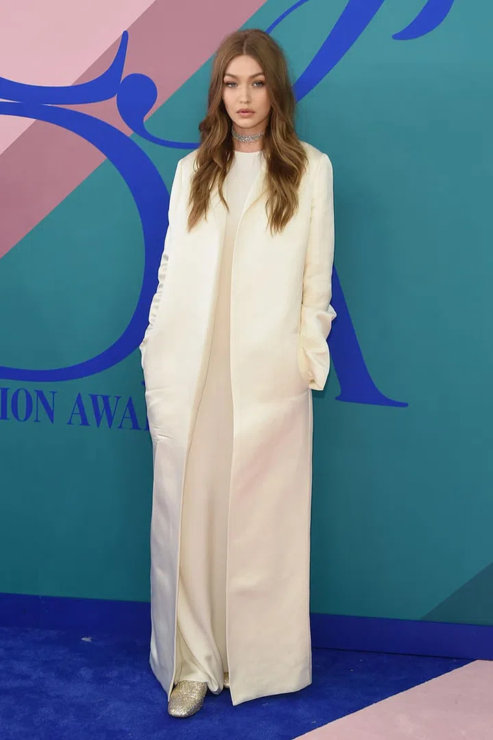 in The Row and Stuart Weitzman. Photo: Getty