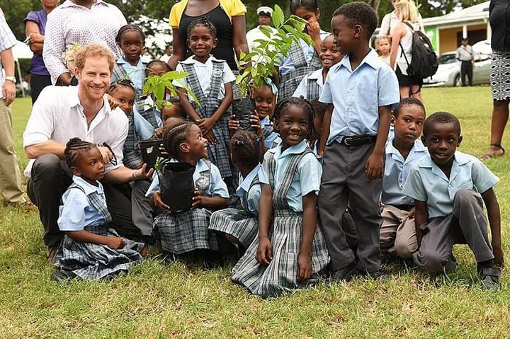 PRINCE HARRY WITH SCHOOL CHILDREN IN ANTIGUA IN NOVEMBER, 2016. Photo: Getty 