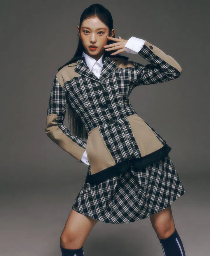 On Haerin: Jacket; shirt; skirt; socks, Dior.

Photo: Park Jongha