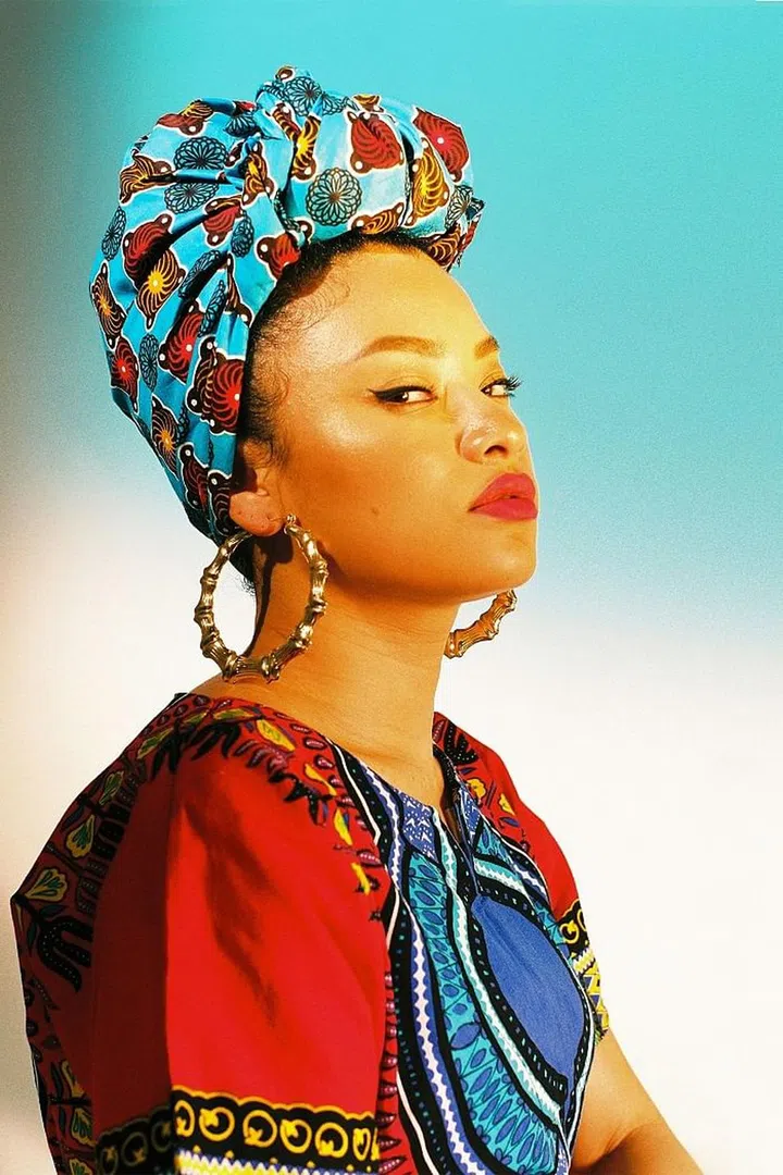 One of the key jewelry pieces in the show is a pair of bamboo-patterned, gold door-knocker earrings. A symbol of African American fashion, the earrings have been made famous by Salt N Pepa and Rihanna. With the recent controversy around the mural in Claremont that read: “White girls, take off your hoops,” it raises questions around cultural appropriation as fashion statement. Photo: MOMA