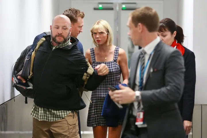Taylor accompanied Tom to Australia so he could morph into his evil alter-ego, Loki. At this point, everything started (slowly) going downhill. We blame Thor.