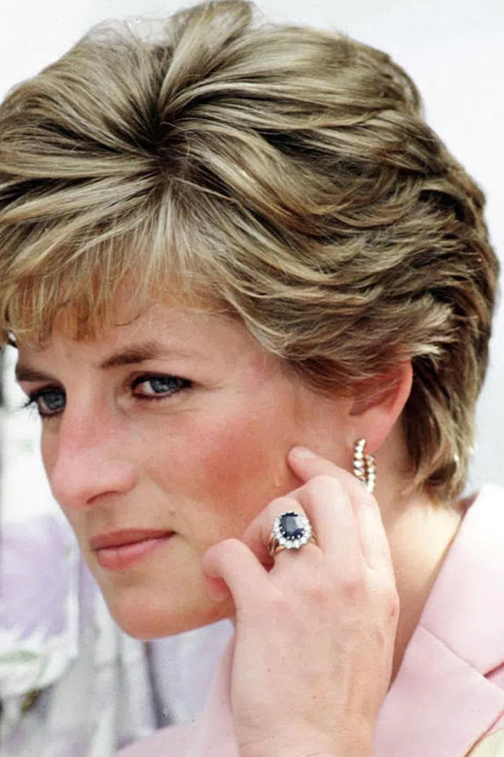 Although royal engagement rings are usually custom made, the 19-year-old bride selected hers from the Garrard jewelry collection catalog. Now Duchess Kate Middleton wears the ring, made of 14 solitaire diamonds around a12-carat sapphire set in white gold.