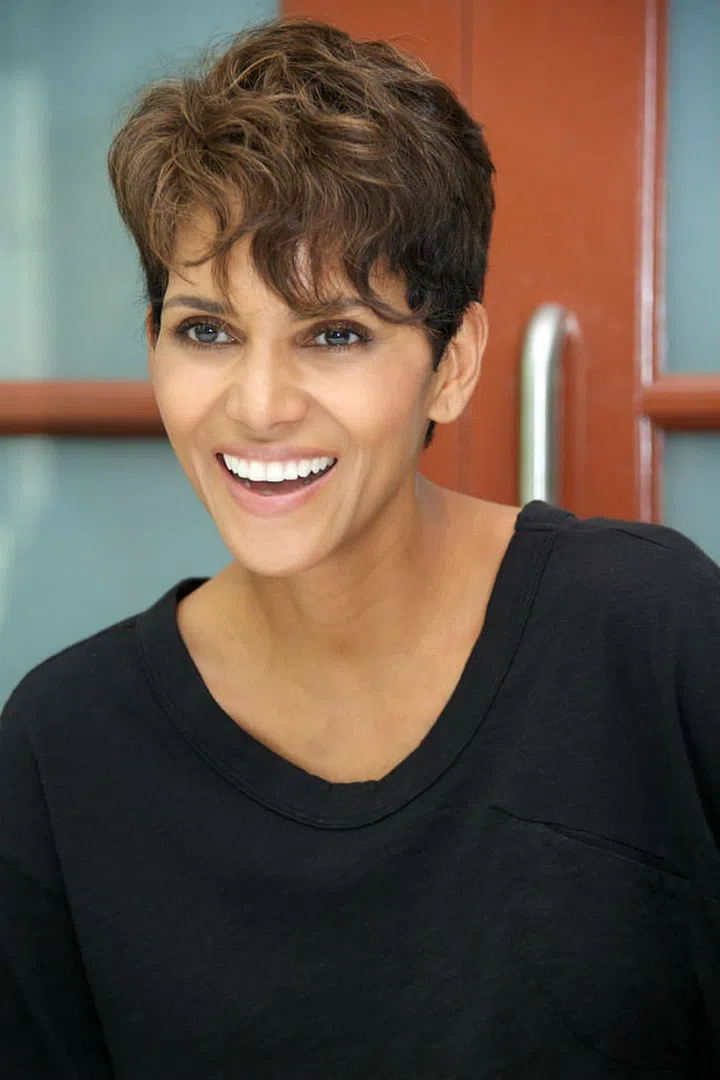 For a textured style like Berry's, it pays to have curly hair. Keep the bangs long and the sides shaved to mimic this super edgy look. Photo: Getty