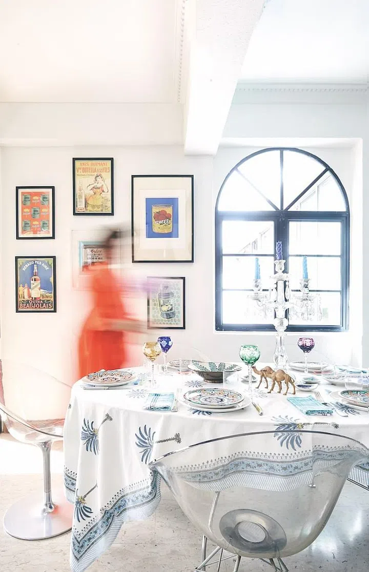 A Kartell dining table with chairs by Philippe Starck (Photo: Veronica Tay)