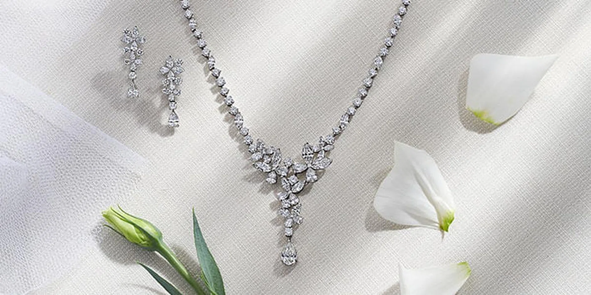 GRAFF Butterfly Collection multi-shape diamond necklace (17.71 carats); multi-shape diamond earrings (2.54 carats).