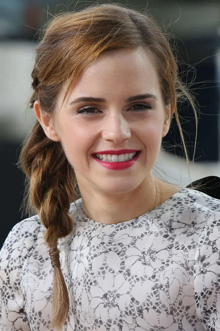 There's nothing more feminine than a bright pink lipstick and breezy side braid.
