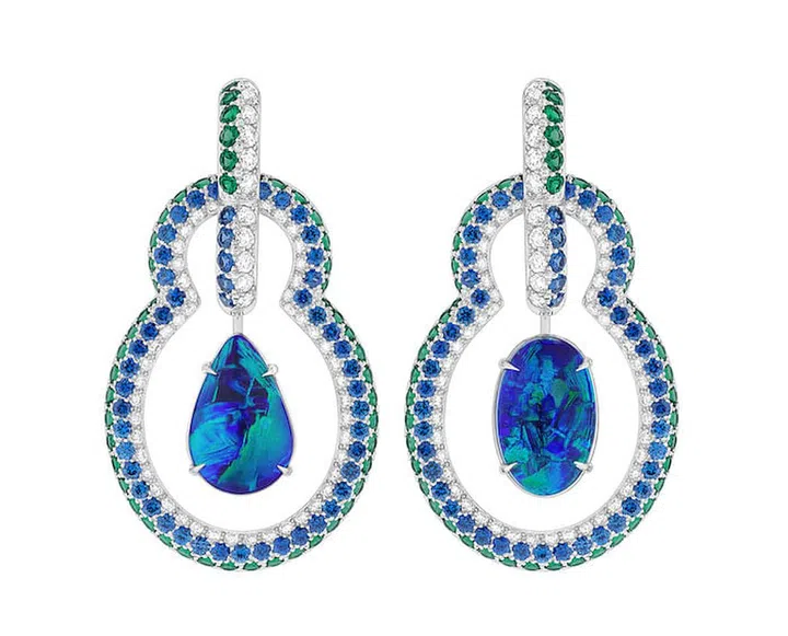 These opal, emerald, sapphire and diamond earrings from the Céleste set owe their unique lines to the top of clouds. (Photo: Louis Vuitton)