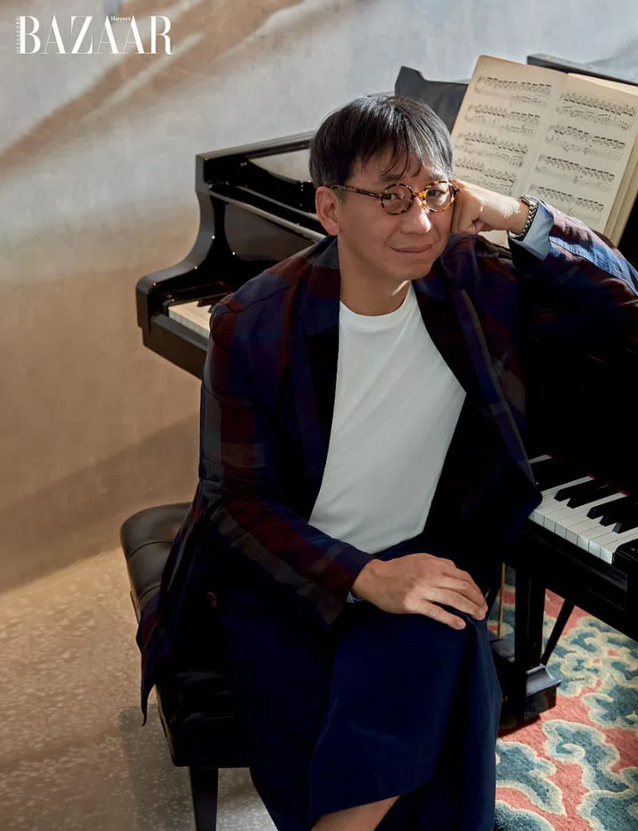 Ian Chee with his Steinway piano.