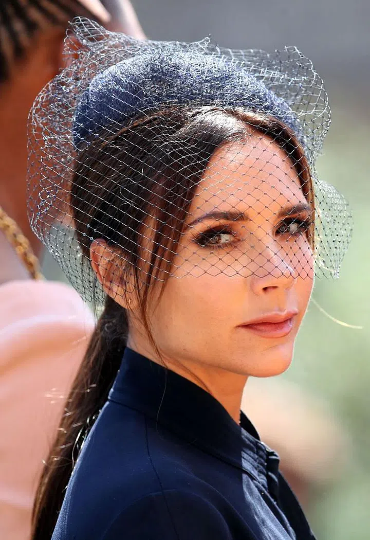Wearing a Philip Treacy fascinator. Photo: Getty