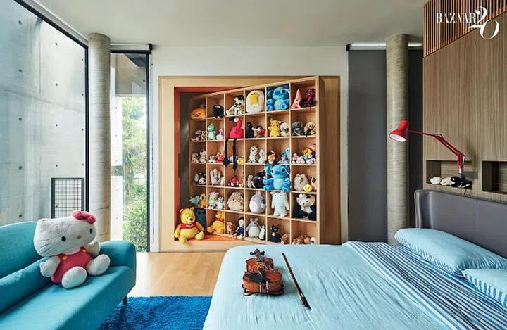 The shelf in Lara’s bedroom swivels to reveal her music studio.

Photo: Phyllicia Wang