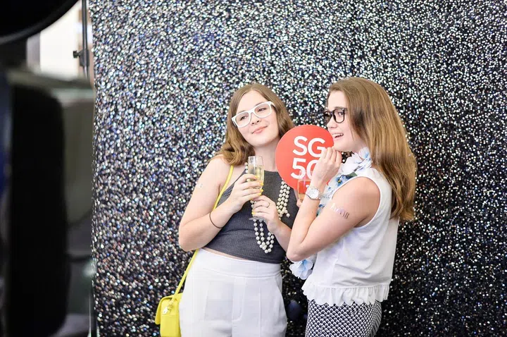 Guests having a field day at the Hello Stranger photo booth