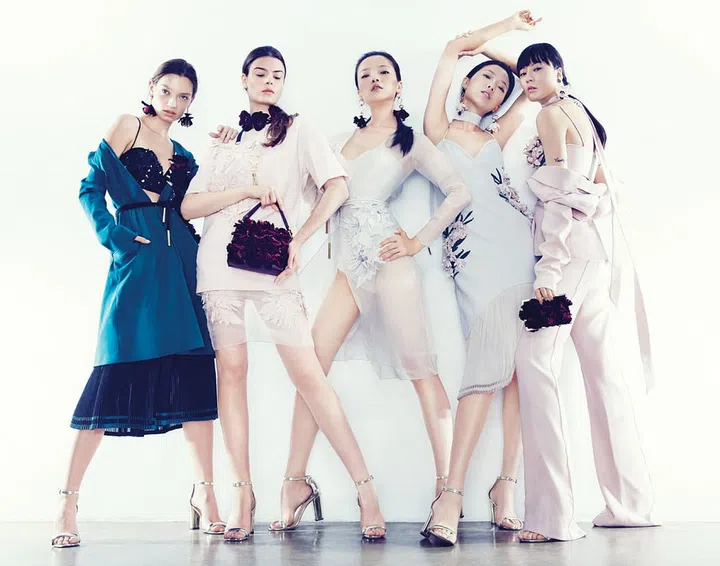Designing under the Valentier label, Perkchinnaworn celebrated the classic ideals of nature and 
feminine beauty with delicately pleated and floral embellished dresses. Clothes; accessories, Valentier