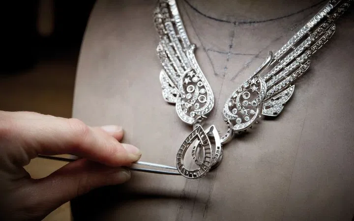chanel reach for the stars wings of chanel savoir faire bezel