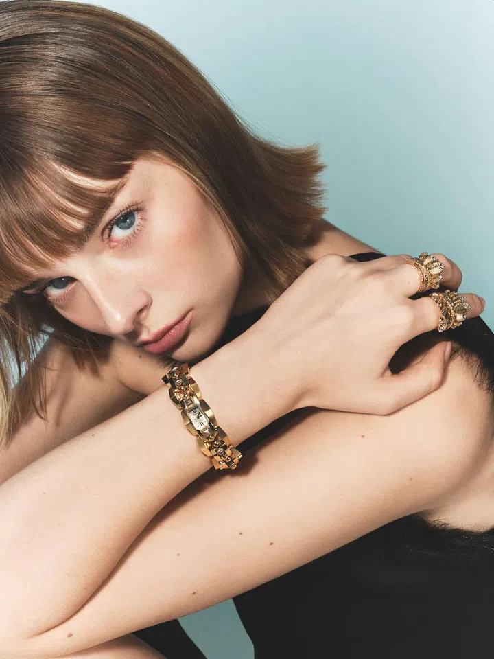 Gold and violet gold Clash [Un]limited watch; gold, white gold and diamond Grain de café ring; white gold and diamond Grain de café ring, Cartier. Dress, Bottega Veneta