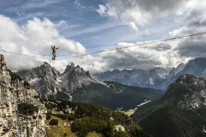 "This is Monte Piana (2324m) in the Italian Dolomites, above the small town of Misurina during the International Highline festival. The mountain is popular with walkers, and in particular slack liners, who come to take advantage of the mountains' numerous buttresses, suspending thin lines between the spectacular cliffs and then attempting to walk over the gaps." –James Rushforth