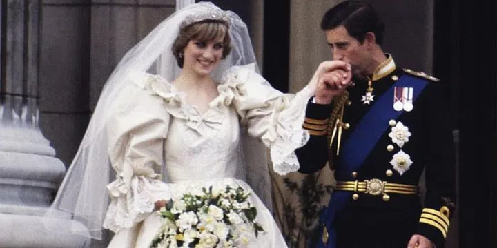 On the balcony of Buckingham Palace on their wedding day. Photo: Getty 