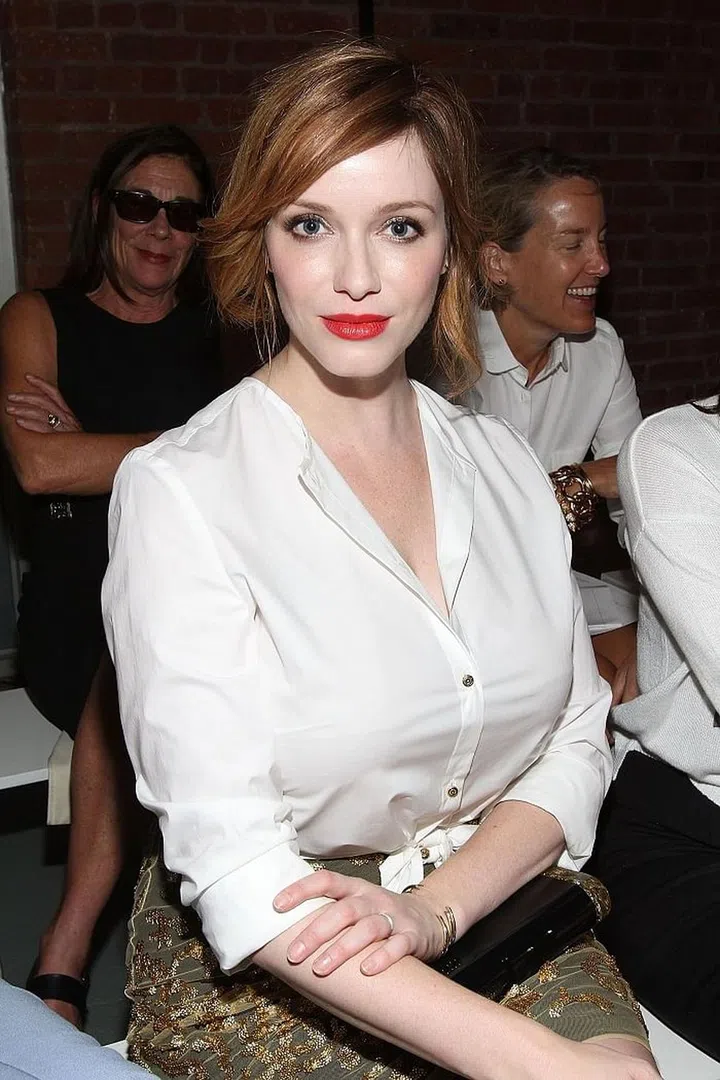 When it comes to a button-down blouse, take the time to find a fit that doesn't create gaps in between the buttons. If you have to, go up a size to make sure the buttons don't pull over your bosom. Photo: Getty  