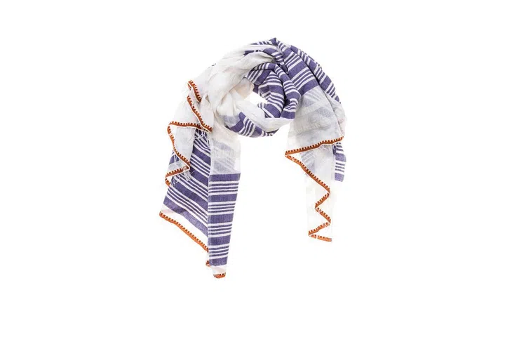 "A scarf that can double as a blanket means you don't have to use the one on the plane." ; Photo: Courtesy of the designers
