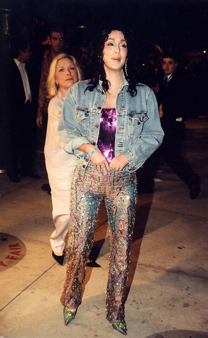 The legend then showed up to an after party that same year in the most bedazzled jeans you have ever seen, a sequin top, bejeweled pumps and denim jacket just to remind us all she's still Queen of the Oscars. Photo: Getty 