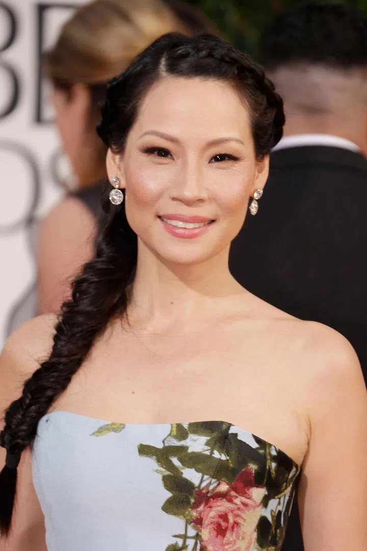 Liu's fishtail begins at the hairline, creating a regal touch for an evening affair.