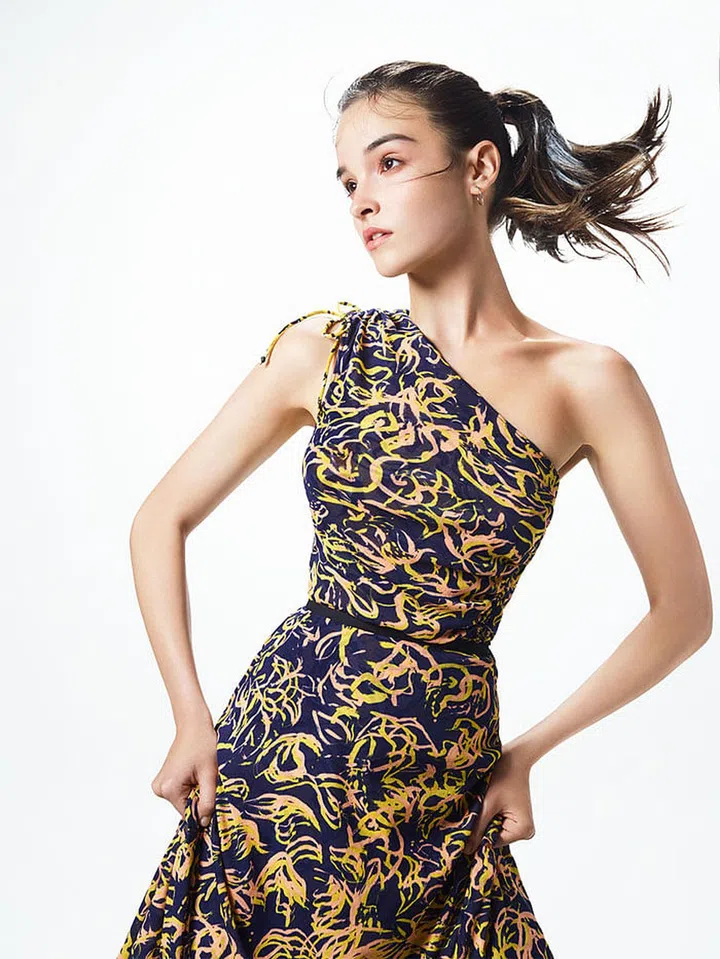 Convertible Nylon Mesh One Shoulder Top, $360; Convertible Nylon Mesh Midi Skirt, $440, Diane Von Furstenberg