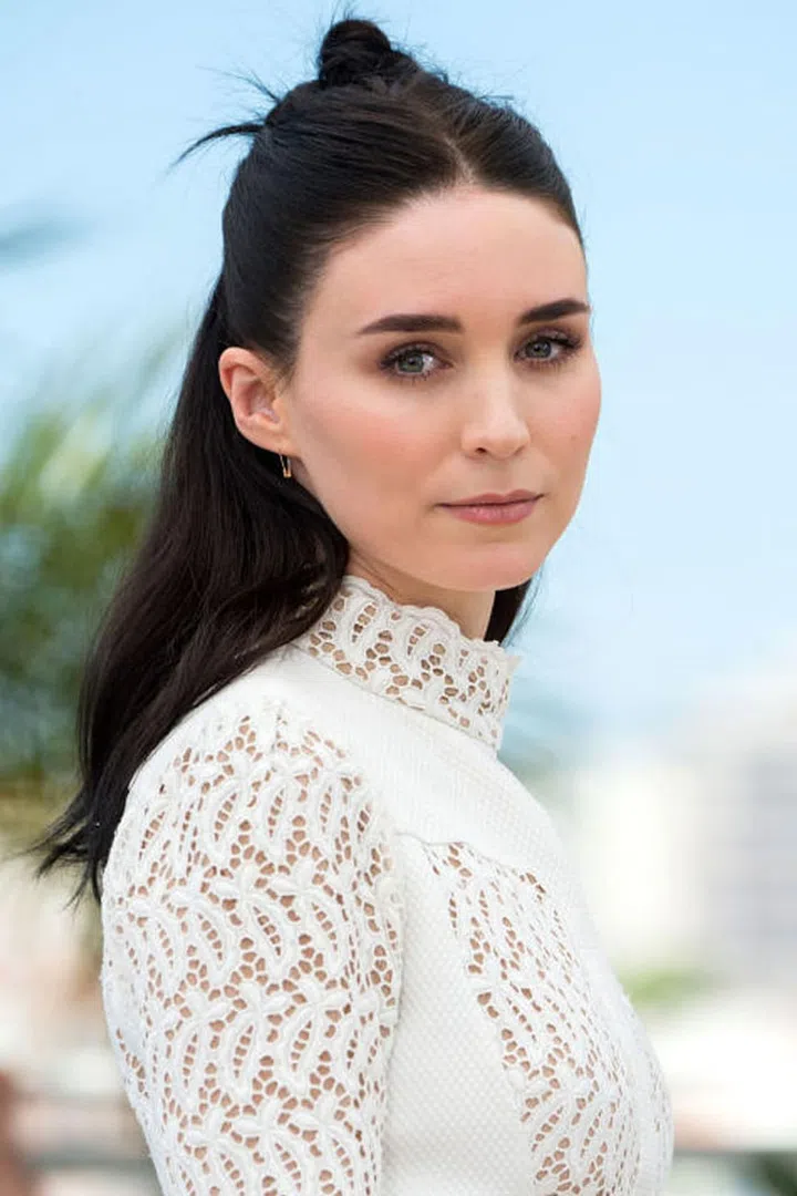 Keep a long hairstyle interesting by tying back a mini bun that's placed towards the back of your head rather than on top of it. Photo: Getty