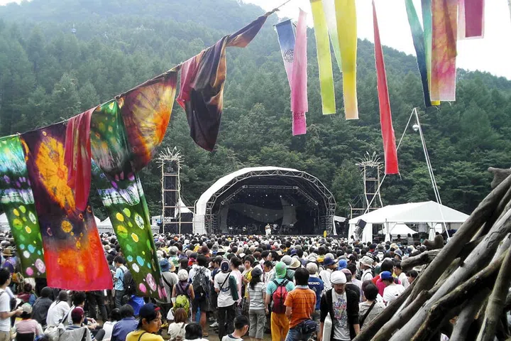 WHEN: July 22-24, 2016
WHERE: Mount Naeba, Japan
WHY: You know you're attending a special music festival when you have to take a cable car to travel between stages. Fuji Rock is Japan's largest music festival, nestled in the mountains around the Naeba Ski Resort, boasting verdant hills and trickling streams for the ultimate idyllic setting. And if the view from the world's longest gondola lift doesn't enchant you, perhaps the remarkably clean toilets will.
WHO'S PLAYING: Sigur Rós, Disclosure, James Blake, Beck, Wilco, Red Hot Chili Peppers, and more. 
For additional information and tickets visit fujirock-eng.com.
Photo: Flickr Creative Commons/Genta

