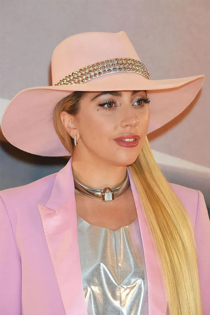 A pin-straight style only adds length to Lady Gaga's golden mane.