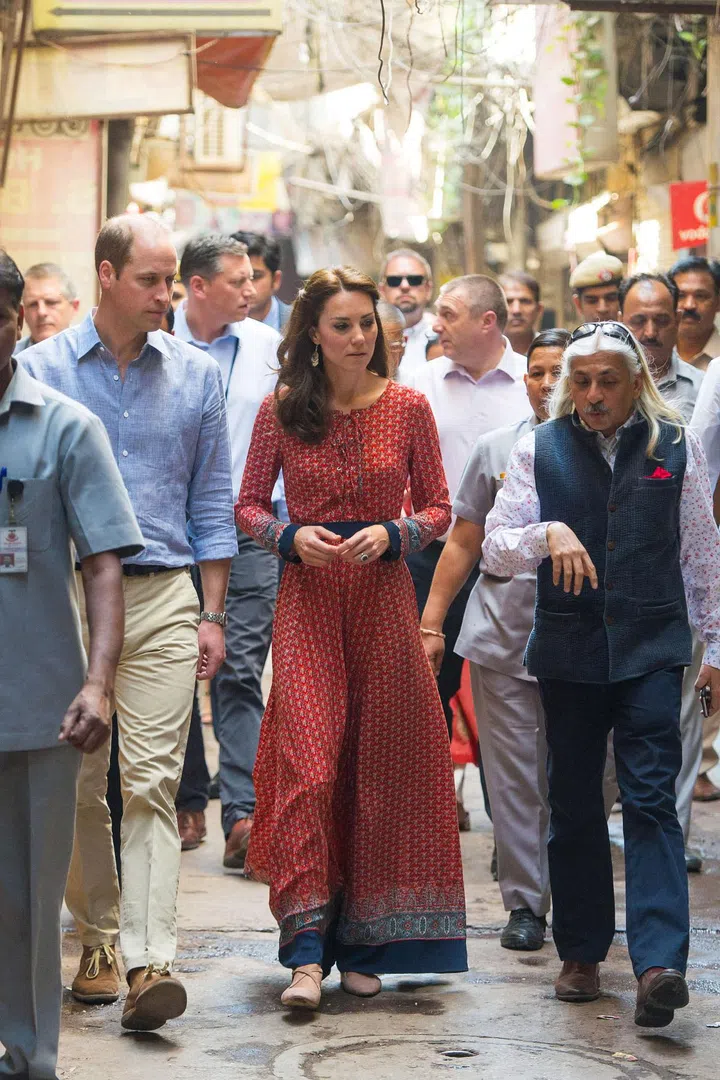 Middleton donned a lace-up printed maxi dress and nude flats as the royal couple visited a contact centre run by the charity Salaam Baalak that provides aid to homeless children in New Delhi.