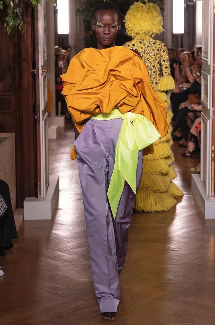 Pierpaolo Piccioli’s latest collection was about self-expression at the highest level. His ideas of inclusivity and diversity shone through not only in the brilliant casting, but also in the range of personalities and needs the collection dressed and addressed. The looks ran the gamut from restrained elegance all the way to pure fashion fantasy. In the latter camp, there were Adut Akech’s swirl of amethyst ruffles and a gown of hundreds of rose gauze squares beribboned together. On the quieter side, daywear was a standout. There were pared-back t-shirts and trousers in the most handsome materials; a taff eta coat was casually shrugged around the elbows; Lauren Hutton walked the show in a chic cashmere parka. What tied it all together was Piccioli’s use of intense, searing colour, often in gorgeously unexpected combinations such as saff ron and lilac, aubergine and pistachio, and blush and lime. Cue standing Os all around. 

Photo: Courtesy