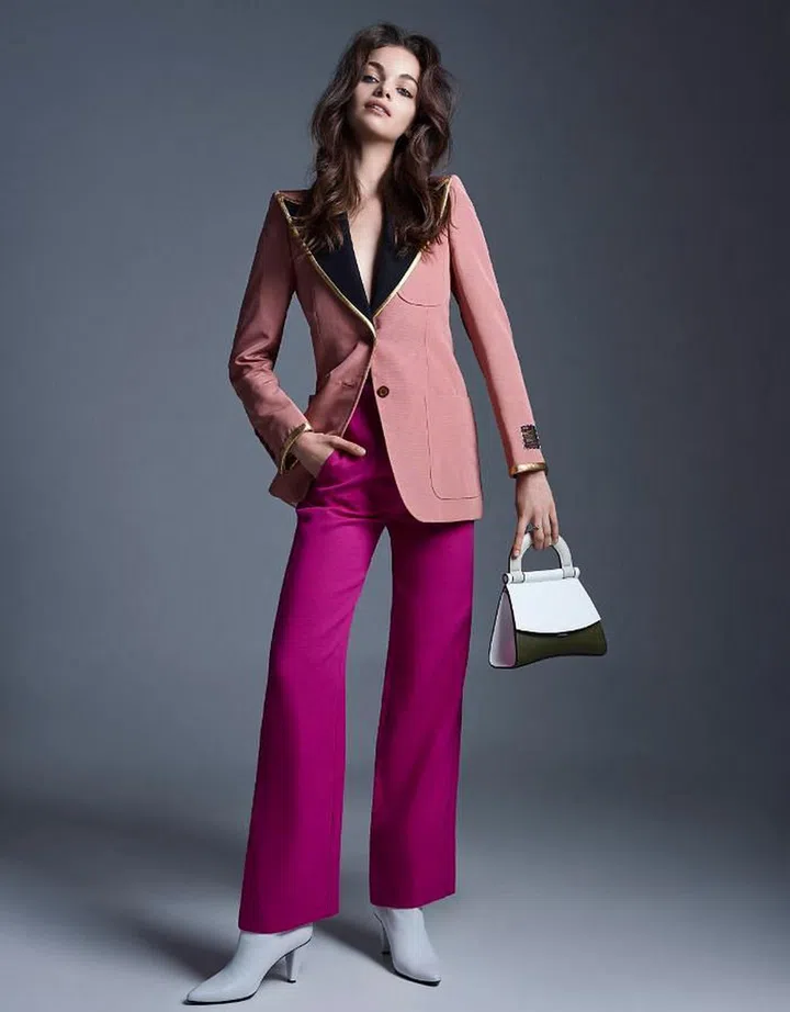 Cotton blazer, Gucci.  Viscose trousers, Maje.  Crystal rings, Swarovski.  Leather boots, Longchamp. Faux leather bag, Charles &amp; Keith.

Photo: Wee Khim