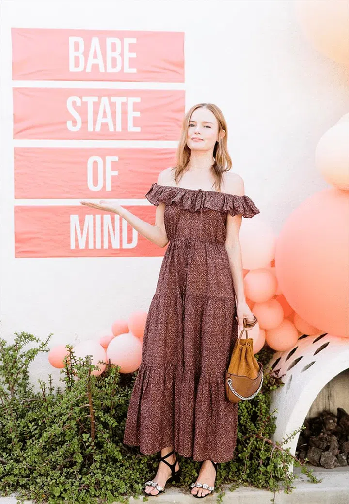 Kate Bosworth brings prairie chic to the land of mini dresses, making for an elegant—and unexpected—juxtaposition.

Shop it: LoveShackFancy dress, $475, modaoperandi.com.