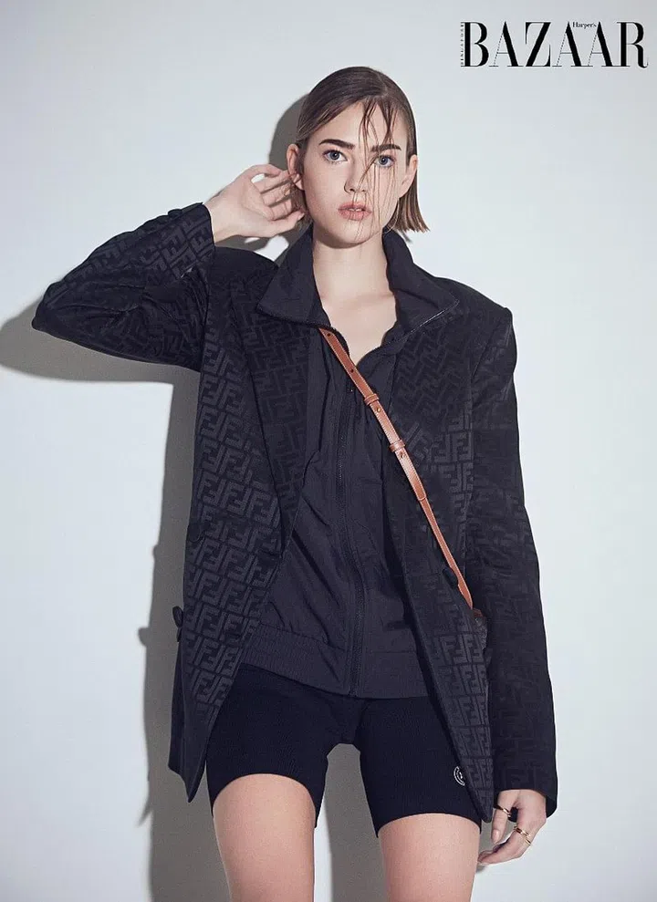Blazer, Fendi. Jacket, adidas. Shorts, Dior. Bag, CELINE. Rings, Bottega Veneta