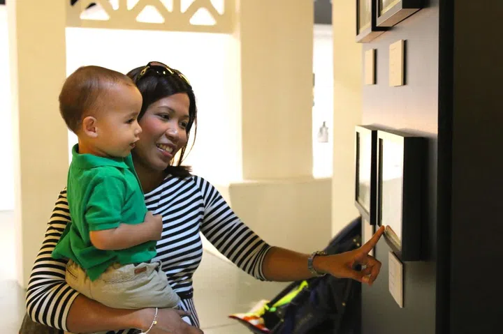 Adults and toddlers alike were absorbed in the fascinating display of digital art. 