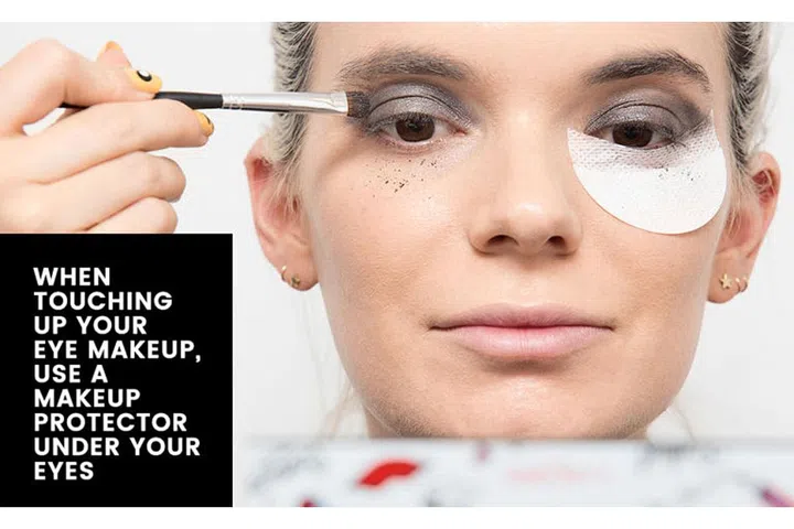 11. Use a tissue or a makeup shield to protect your base makeup. If you already have your foundation on, hold a tissue against your face (or use a makeup shield, like the ones from Shadow Shields) to protect your base from becoming a complete mess from eye shadow fallout. If you do get any fallout on your face, pick it up with translucent tape, since it's the least strong tape and won't pull at your skin.