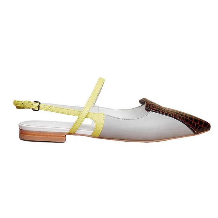 Fluoro yellow and cognac croc color-blocking add a graphic element to a long white sheath—less "Wanna join my cult?" and more "Wanna join my technology-based, *super fun* cult?"