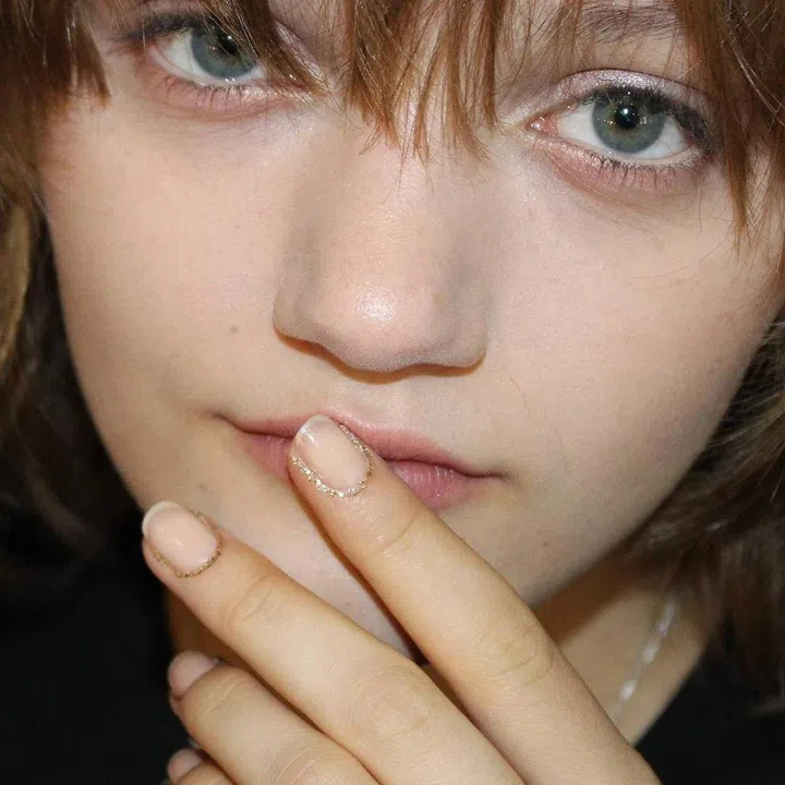 Backstage at Rodarte's spring 2017 show, manicurist Tracylee painted gold glitter polish along the models' cuticles. The effect was as delicate as jewellery. Photo: @luxebytracylee