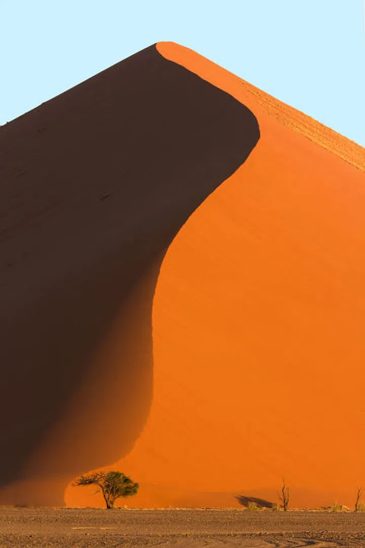Located in Namibia's coastal desert, the remote Sossusvlei region is home to the world's tallest sand dunes including one that is nearly a quarter-mile high.