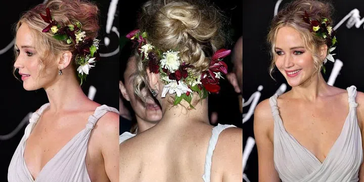 Sometimes the best hair accessory isn't a flower pin—it's just flowers...affixed to pins. Jennifer Lawrence wore an entire bouquet in her hair for a premiere of her film Mother!.