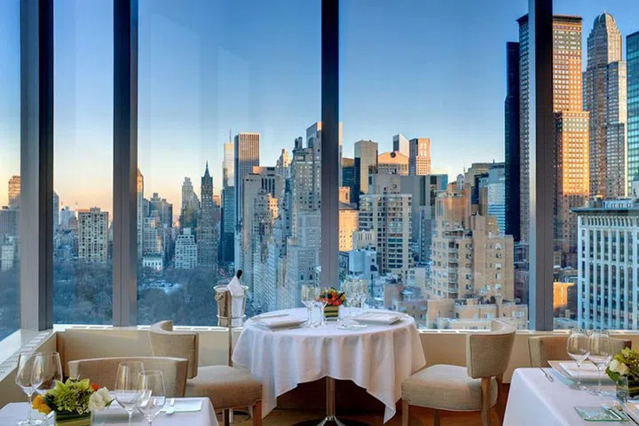  A signature rooftop amongst New Yorkers, you'll oftentimes find the business elite on this hotel's top floor. As you take in iconic views of Columbus Circle and Central Park, sip on an expertly crafted martini and light bites.  Photo: The Mandarin Oriental