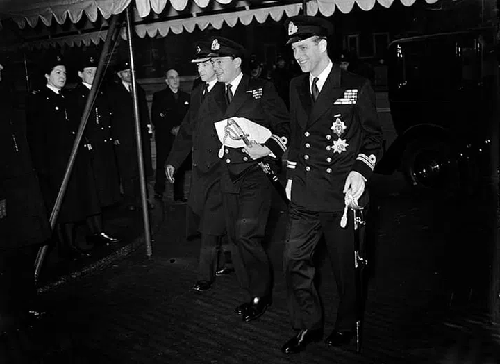 Prince Philip arrives at Westminster Abbey for his marriage to Princess Elizabeth with his best man: the Marquess of Milford Haven.