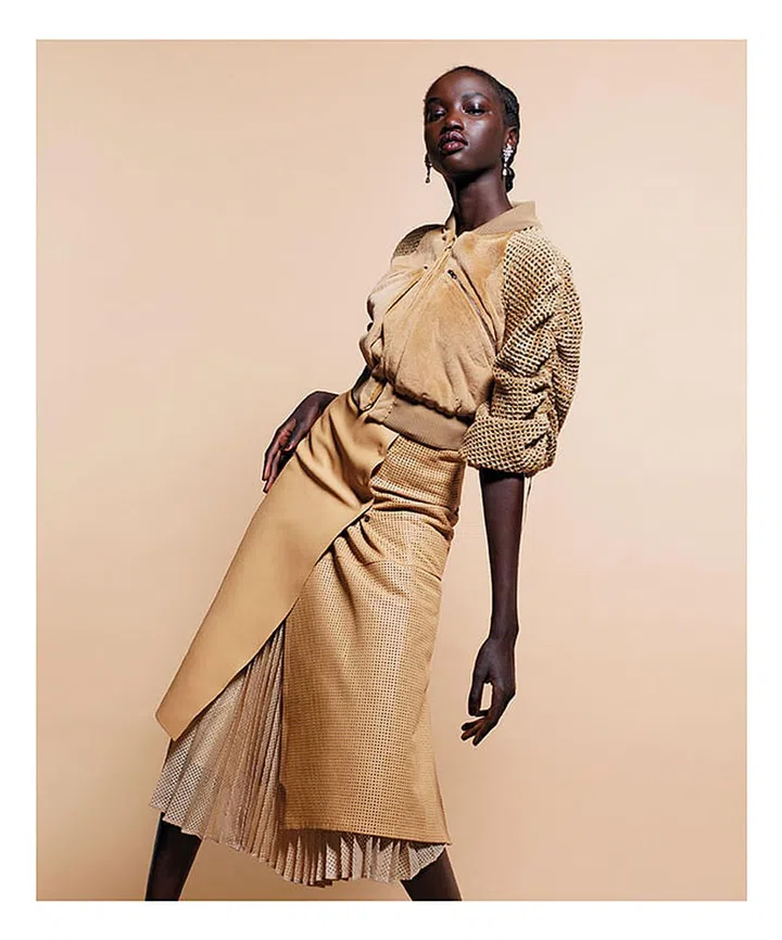 Fendi jacket and skirts; Harry Winston earrings