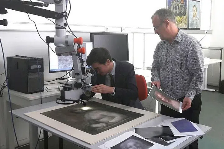 Curators examine the nude sketch speculated to be the precursor to 'Mona Lisa.'