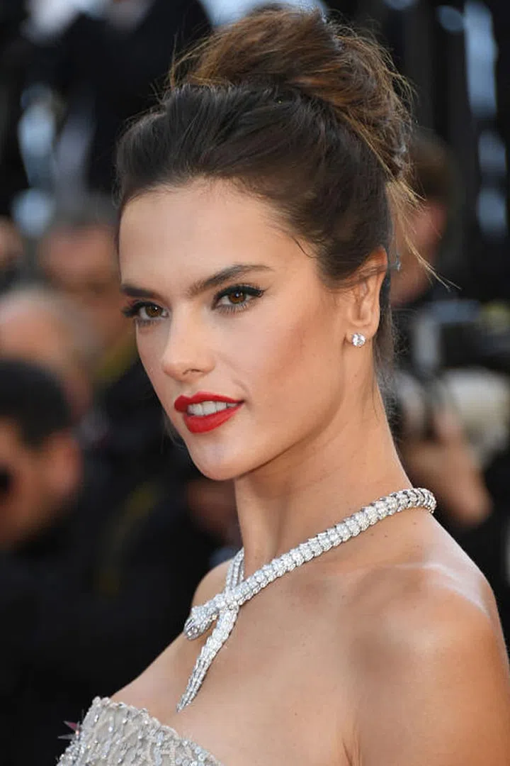 Modern glamour = a low-key twist to juxtapose some serious glitz. Photo: Getty