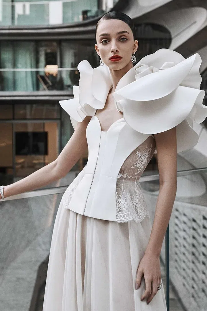Fashion’s favourite statement sleeves were translated to bridal in unexpected ways this season. Apart from volume and exaggerated details as seen in Zuhair Murad and Naeem Khan, removable sleeves made an appearance, giving brides the option to completely change up their look midway through their big celebration, for a fun and decidedly classic twist to your look.
