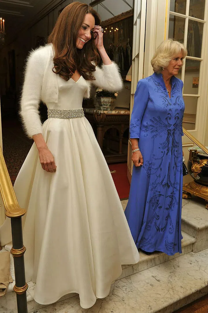 The glowing bride chose another design from Sarah Burton at Alexander McQueen for dinner and dancing. The strapless gown featured a glittering waist and structured bodice.Photo: Getty