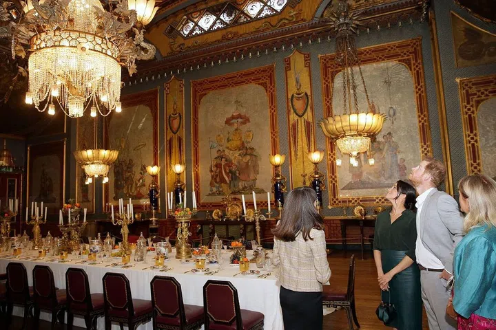 The couple admired the building's ornate interiors.